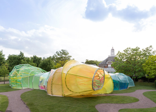 Illustration for article titled I Want to Live In This Colorful Maze Made From Sheets of Plastic